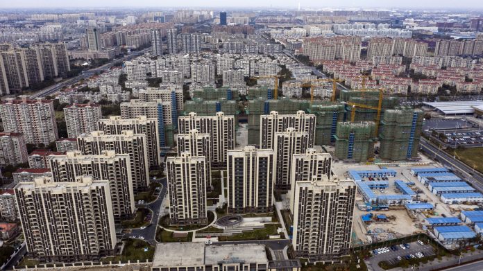 Bytové domy v rezidenčnom projekte Phoenix City, ktorý postavila spoločnosť Country Garden Holdings Co., v Šanghaji 17. januára.Fotograf: Qilai Shen / Bloomberg